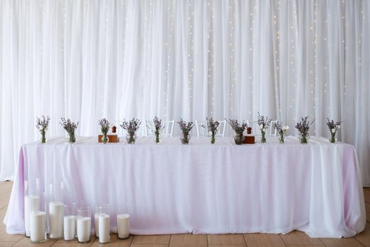 The presidium of the newlyweds in the banquet hall of the restaurant