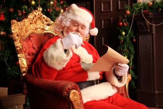 Portrait of Santa Claus answering Christmas letters.