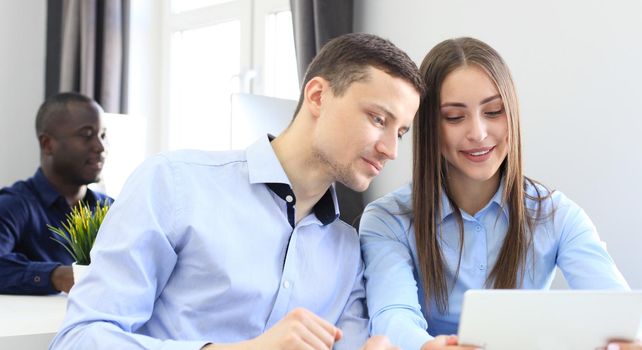Business people working on new project at modern office