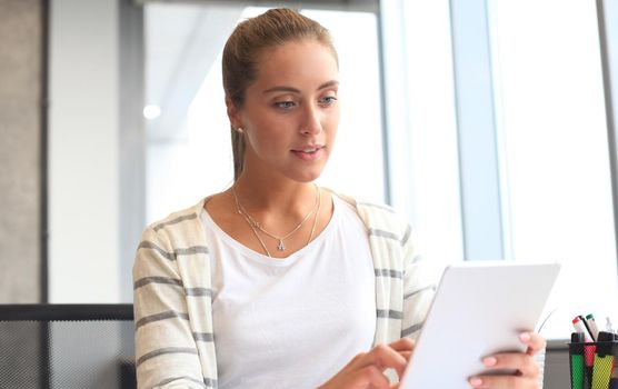 Modern business woman in the office with copy space