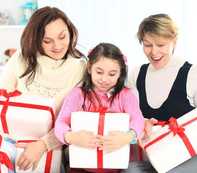 close up.happy family opening a box of gifts.the concept of the celebration.