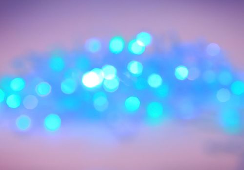 festive blurred background with bright blue lights.photo with copy space
