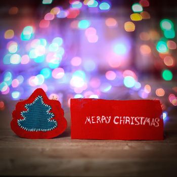 inscription merry Christmas on a festive blurred background .photo with copy space.