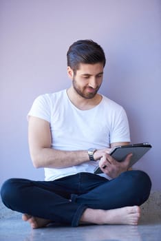 student working on tablet computer at university school modern interior