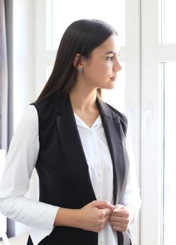 Modern business woman in the office with copy space