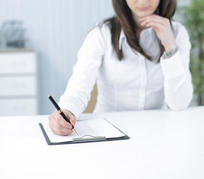 modern business woman working with documents in the workplace in the office