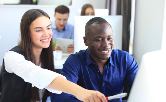 Business people working on new project at modern office