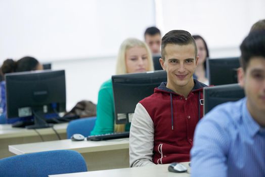 technology students group in computer lab classroom