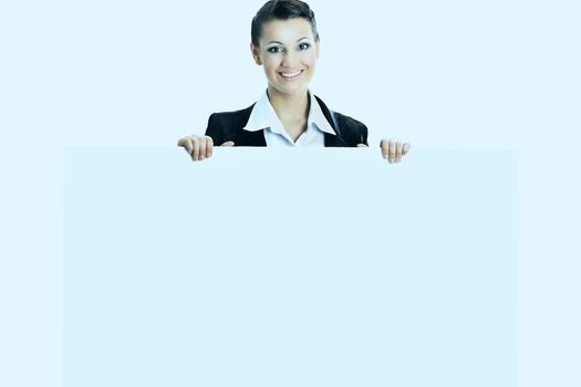 Beautiful business woman with a white banner. Isolated on a white background.