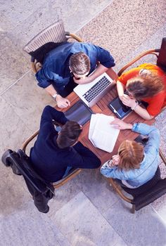 students group working on school  project  together at modern university, top view teamwork business concept