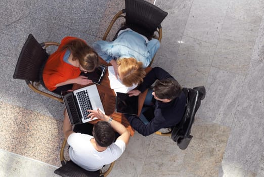 students group working on school  project  together at modern university, top view teamwork business concept