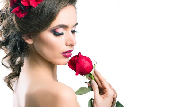 close up.beautiful young woman with a rose.photo with copy space