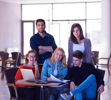 students group standing together as team  in modern school university, teamwork business concept