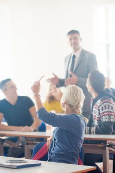 group of students with teacher on class learning lessons