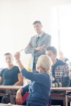 group of students with teacher on class learning lessons