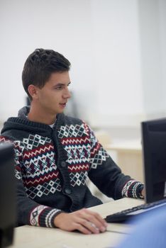 technology students group in computer lab classroom