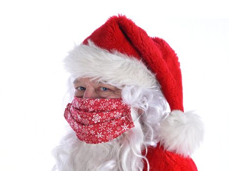 Santa Claus wearing a homemade COVID-19 mask Mrs. Claus made for him.