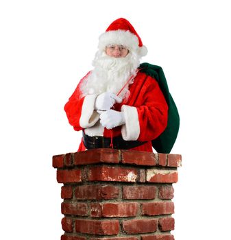 Closeup of Santa Claus inside a brick chimney with his bag of toys flung over his shoulder. Vertical format on a white background.