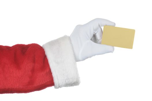 Santa Claus holding a gold credit card isolated over white. Gloved hand and sleeve only  ideal for Christmas shopping concept, lay-away, or consumerism.