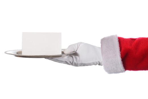 Santa Claus hand holding silver tray and blank note. Horizontal format arm with hand only outstretched from right side isolated on white