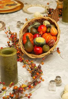 Holiday Dinner Table Centerpiece with Candles, Garland and Cornucopia