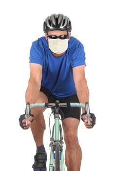 Closeup of a man wearing a covid-19 surgical mask riding a road bike isolated on white. 