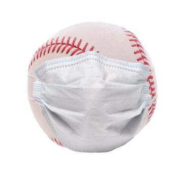 Covid-19 and Sports Concept. A baseball with Surgical Mask, isolated on white