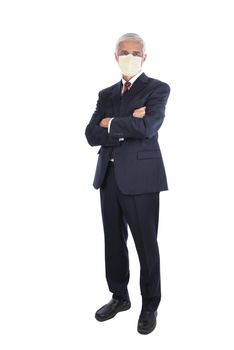 A businessman standing with his arm folded while wearing a protective mask, Isolated on white.
