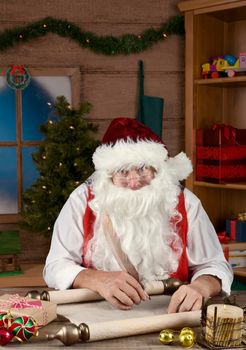 Santa Claus writing his Naughty and Nice List in his North Pole Workshop.