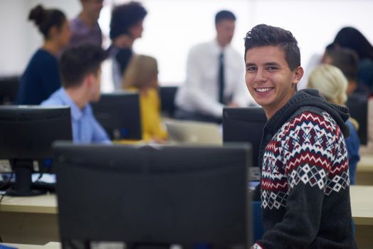 technology students group in computer lab classroom