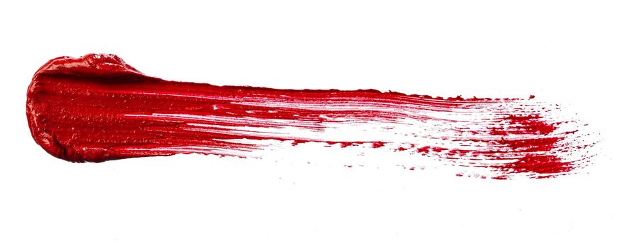 Stain swatch of a red matte lipstick isolated on white background