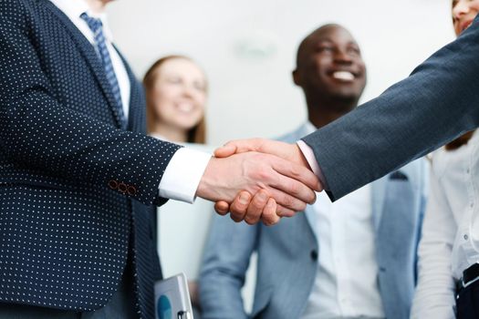 Business people shaking hands, finishing up a meeting