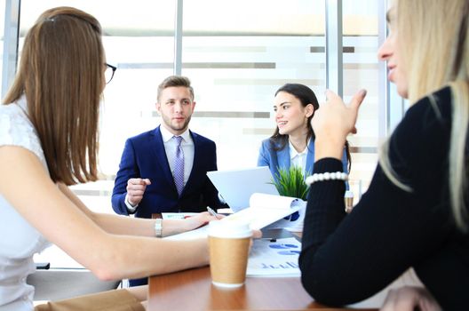 Business people working on new project at modern office