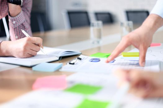 Image of business people hands working with papers at meeting