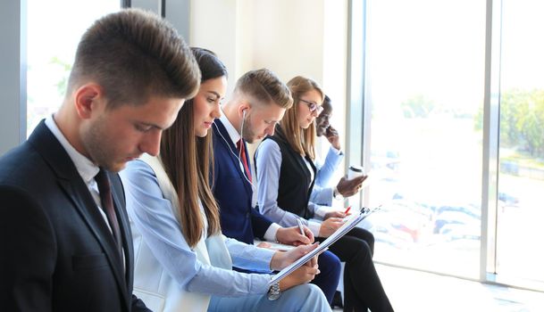 Business people waiting for job interview