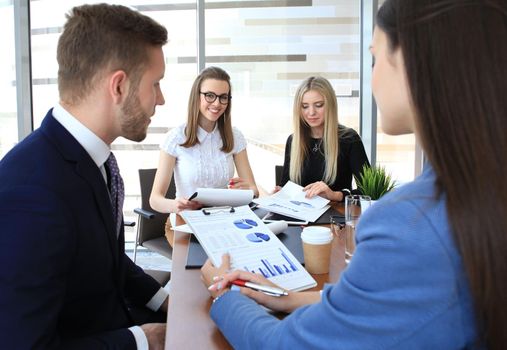 Business people working on new project at modern office