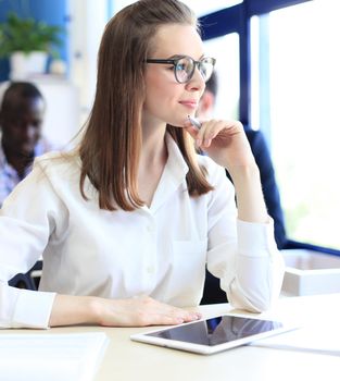 business woman with her staff, people group in background at modern bright office indoors