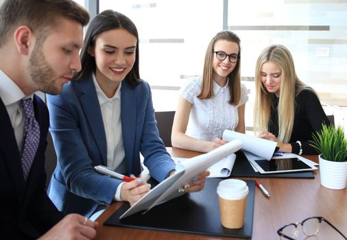 Business people working on new project at modern office