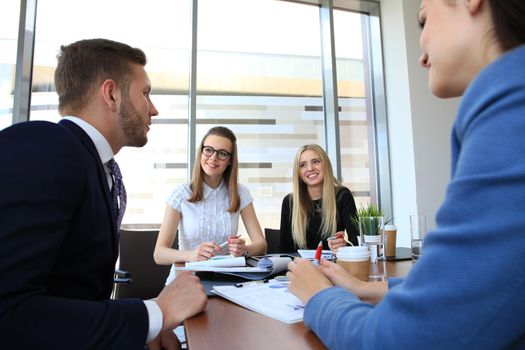 Business people working on new project at modern office