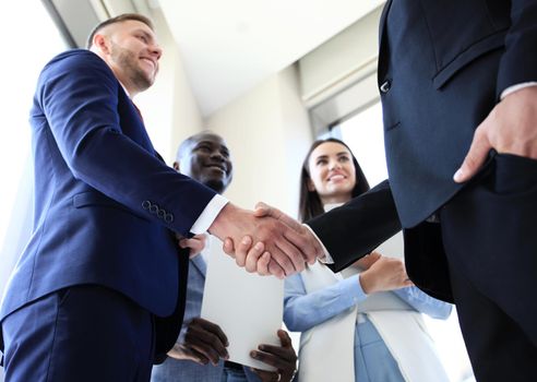 Business people shaking hands, finishing up a meeting