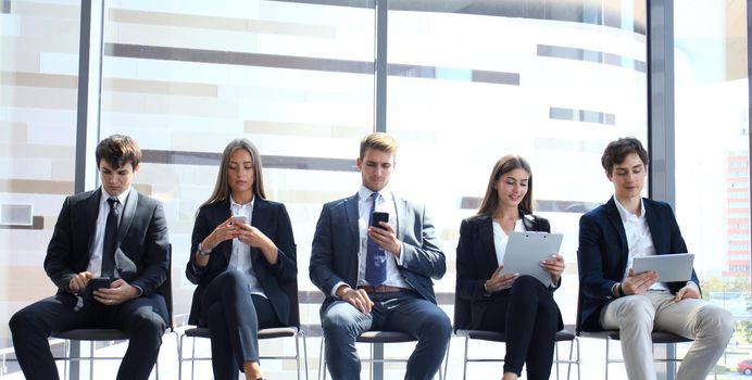 Business people waiting for job interview