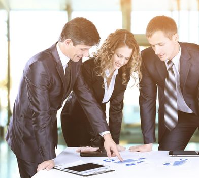 Business team working on their business project together at office