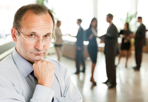 closeup of a psychologist consultant on the background of the office. the photo has a empty space for your text