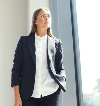 Modern business woman in the office with copy space