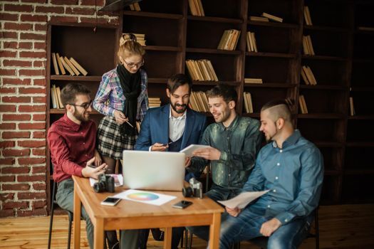 business team discussing a new advertising project of the company in a modern office