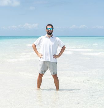 One man is enjoying beautiful tropical beach