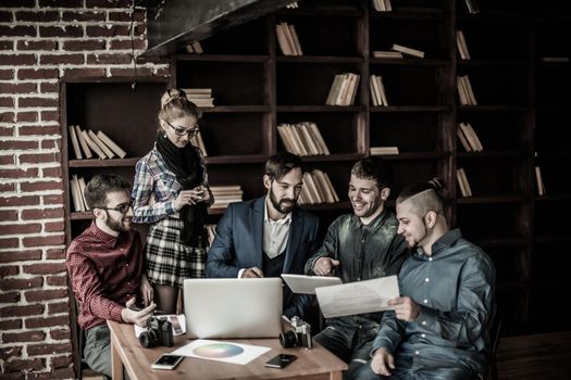 business team discussing a new advertising project of the company in a modern office