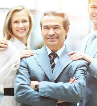 Group of business people with businessman leader on foreground