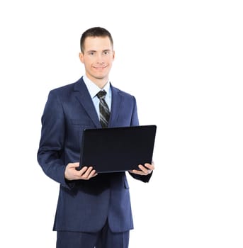 young businesswoman with a laptop on a white background, smiling and looking at the frame