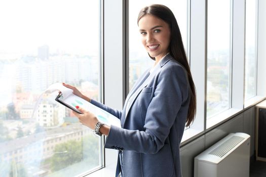 Modern business woman in the office with copy space